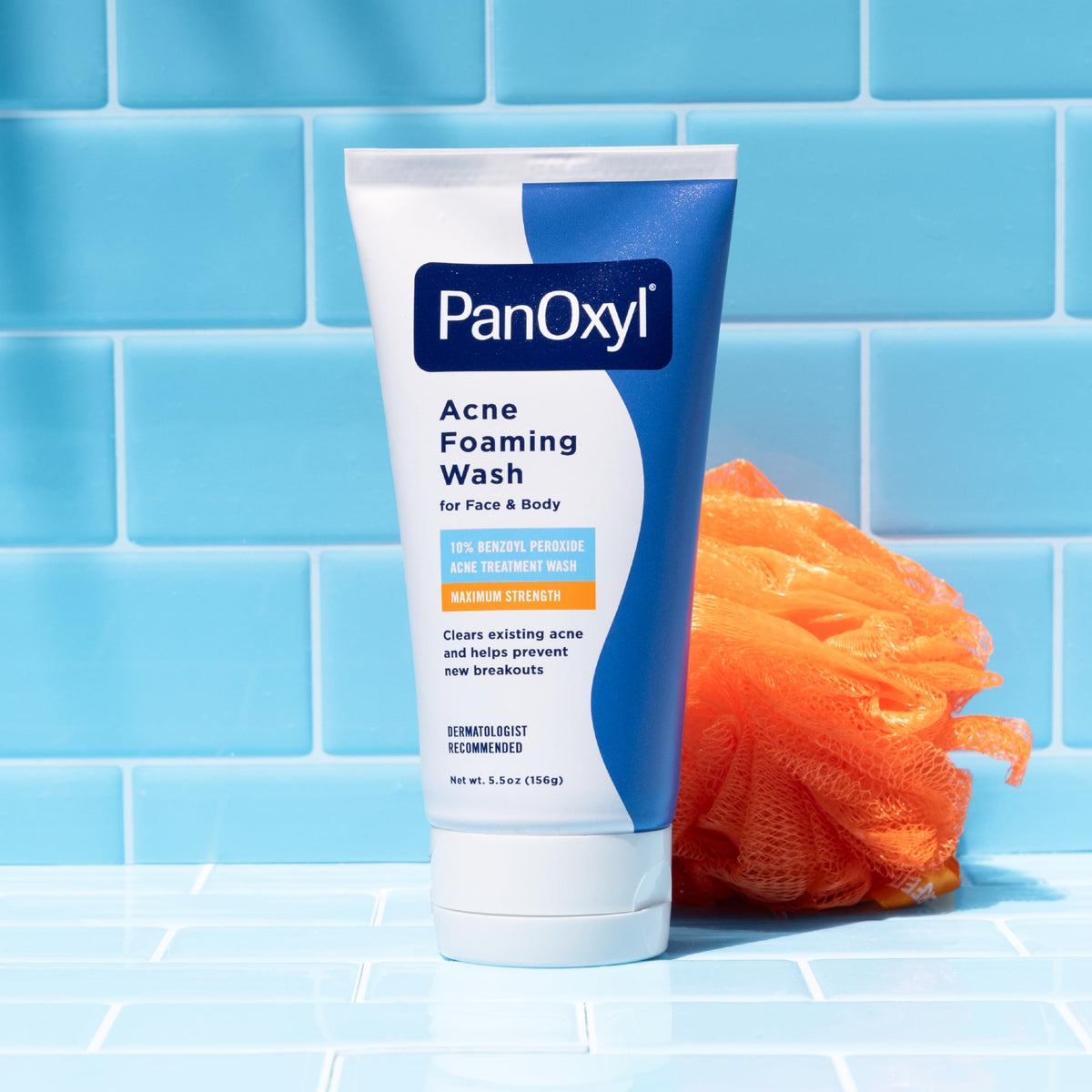PanOxyl tube held in hand to show 5.5 oz size and travel convenience