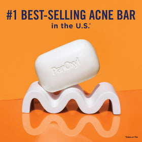 PanOxyl lather in hands demonstrating rich foam and easy application benefit