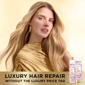 Pantene conditioner cream spread on palm for rich hydration