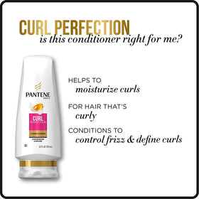 Pantene applying conditioner to wet curls for detangling and moisture benefit