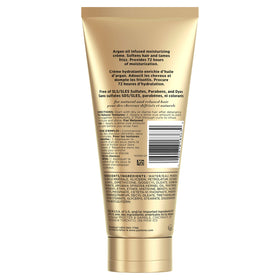 Stylist holding Pantene Gold Series recommending product for hydration and manageability