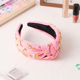 PANTIDE headband worn by dancer keeping hair back and adding elegant shine