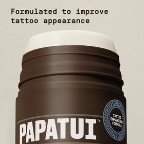 PAPATUI being applied to forearm tattoo for targeted hydration and enhancement