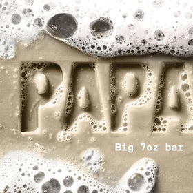 PAPATUI soap held in hand for scale highlighting travel convenience