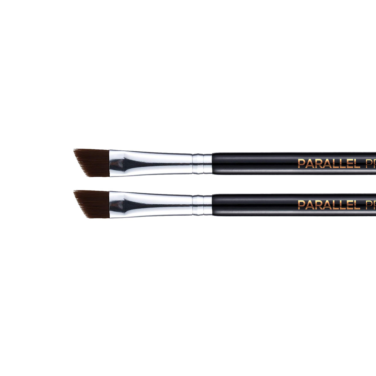 PARALLEL PRODUCTS brush in hand for scale showing comfortable grip and control benefit