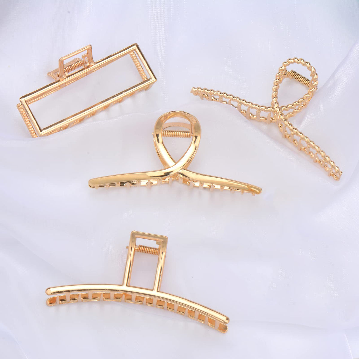 Parcce all four different claw designs laid out, styling variety