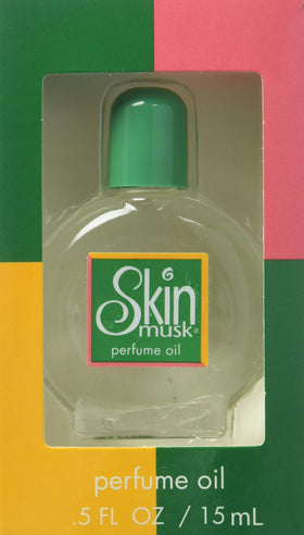 Parfums De Coeur Skin Musk held in hand to show travel-friendly size and ease