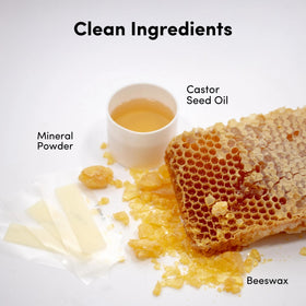 Parissa applying soothe oil to chin after waxing to calm skin and remove residue