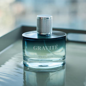 Particle Gravité open cap and label detail emphasizing brand and premium packaging elements