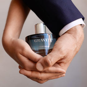 Particle Gravité in a travel kit with grooming essentials, convenient for on-the-go freshness