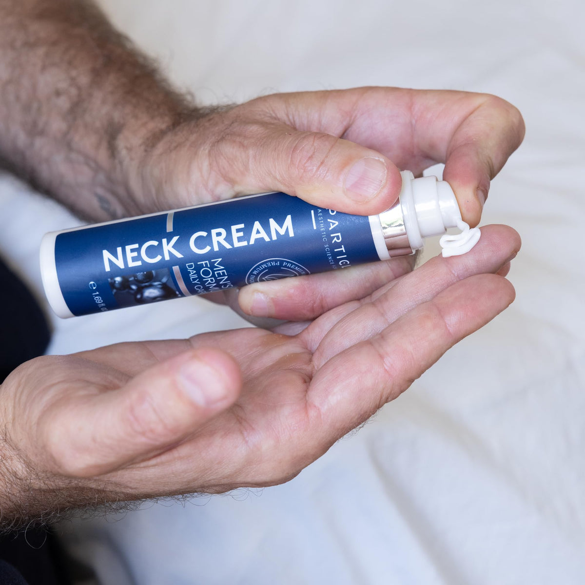 Particle neck cream ingredient label close-up showing key actives for hydration benefit