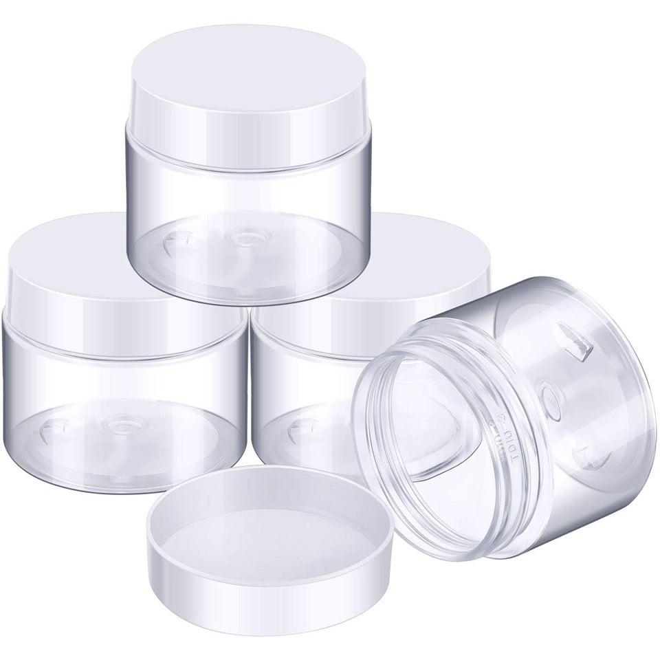 Patelai front view of four jars showing clear bodies and white lids, durable convenience