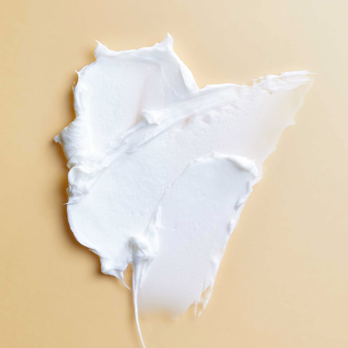 PATTERN cream buttery swirl texture highlighting smooth application benefits