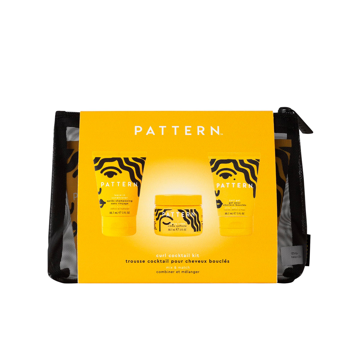 PATTERN mesh cosmetic bag open with mini leave-in, cream, and gel organized for convenience