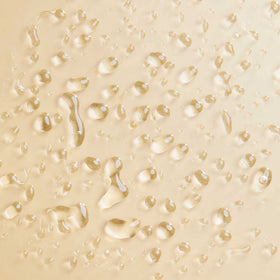 PATTERN milky-texture droplet on fingertip showing lightweight hydrating consistency