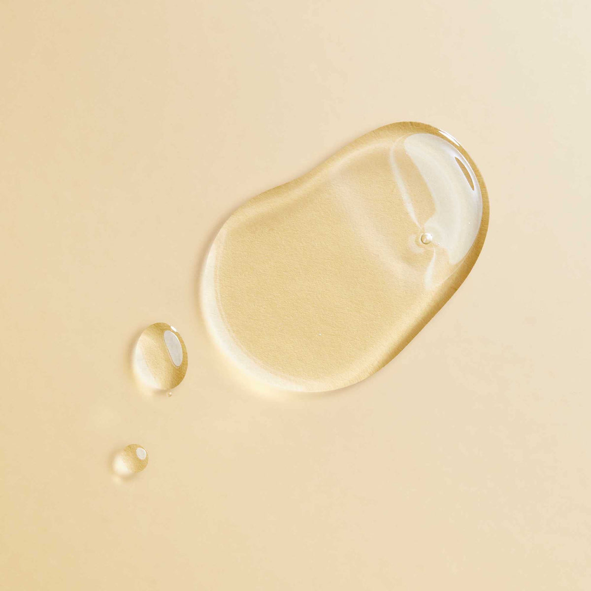PATTERN oil droplet texture on hand showing lightweight absorption