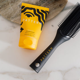 PATTERN applying leave-in to wet hair to detangle and reduce breakage benefit