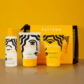 PATTERN mesh pouch with kit beside passport to show travel-ready size