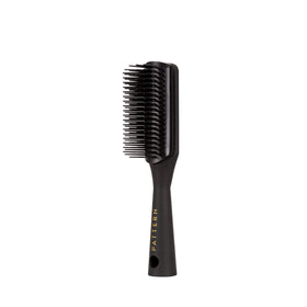 PATTERN brush bristle close-up displaying seven flexible rows that gently detangle and define
