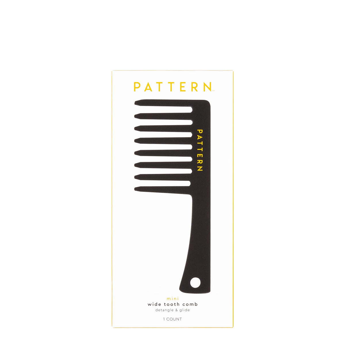 PATTERN comb being used to fluff curly hair for natural volume and separation