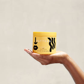PATTERN jar next to hand for size and scale helping shoppers visualize container volume