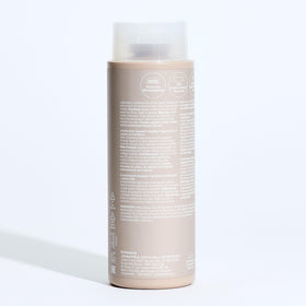 Paul Mitchell recycled packaging close-up showing PCR materials and eco benefit