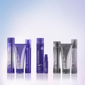 Paul Mitchell bottle held in hand to show 5.1 fl oz scale and convenient travel benefit