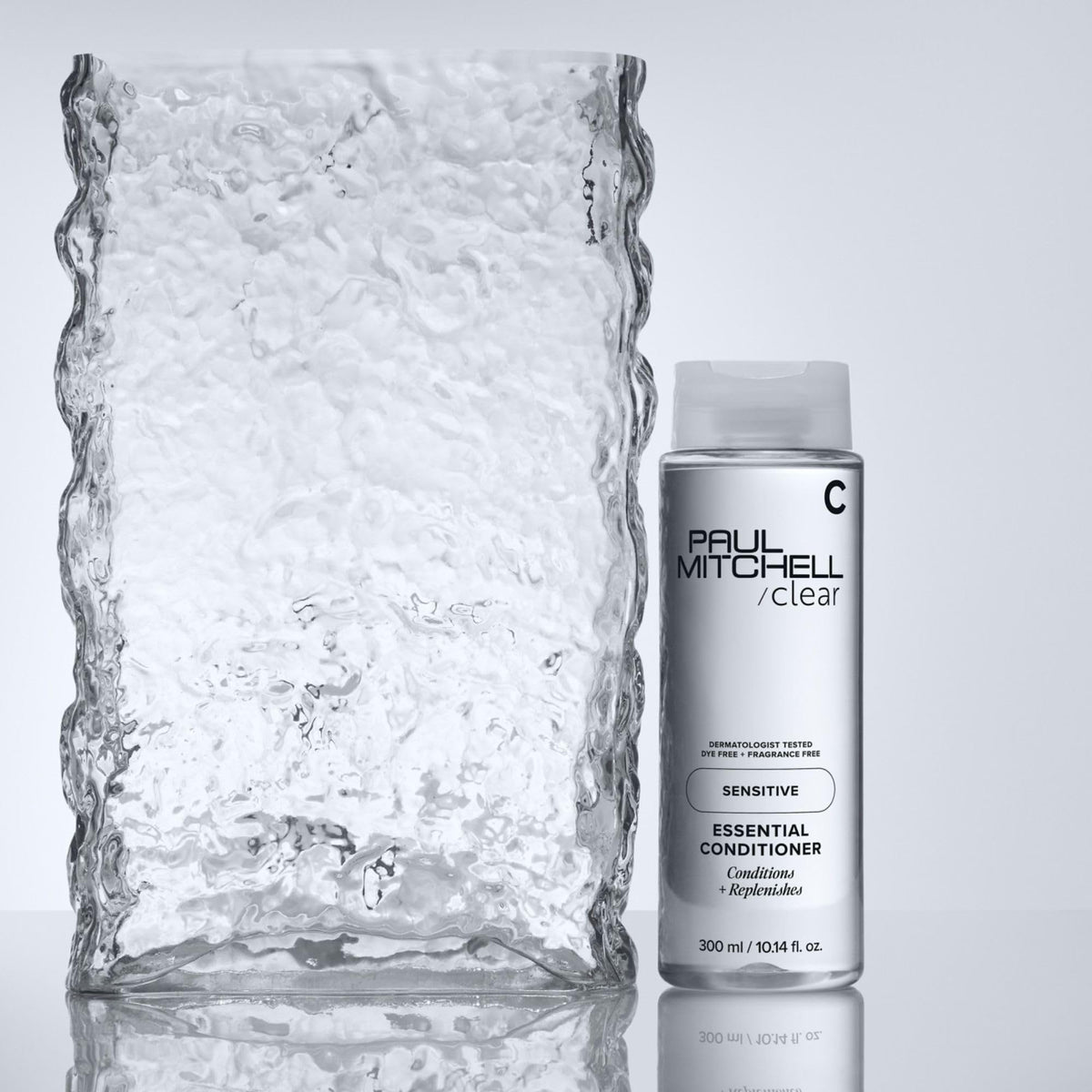 Paul Mitchell before and after hair comparison showing softer, manageable strands