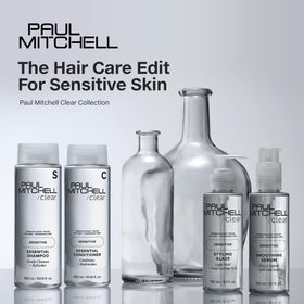 Paul Mitchell bottle next to hand for scale, highlighting the 10.14 fl oz size