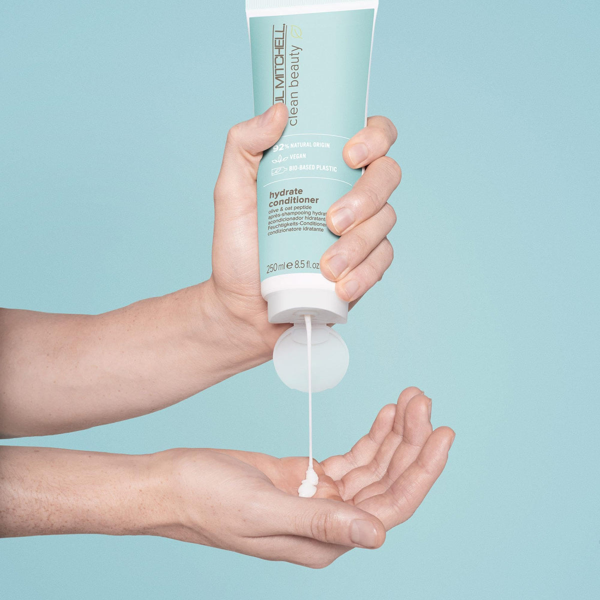 Paul Mitchell close-up of pump dispensing, showing easy-use and controlled dosing benefit