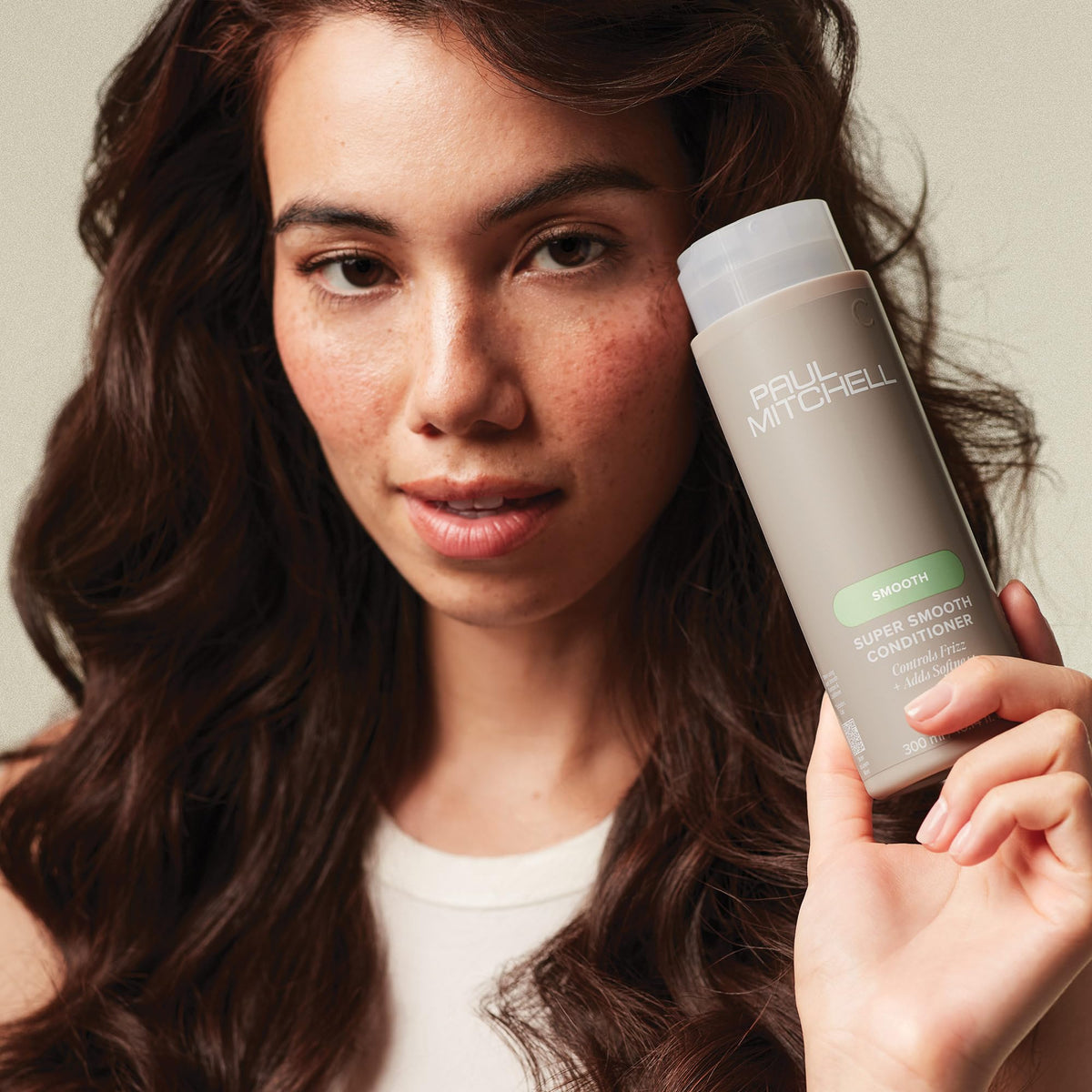 Paul Mitchell Super Smooth in shower applied to hair demonstrating detangling benefit