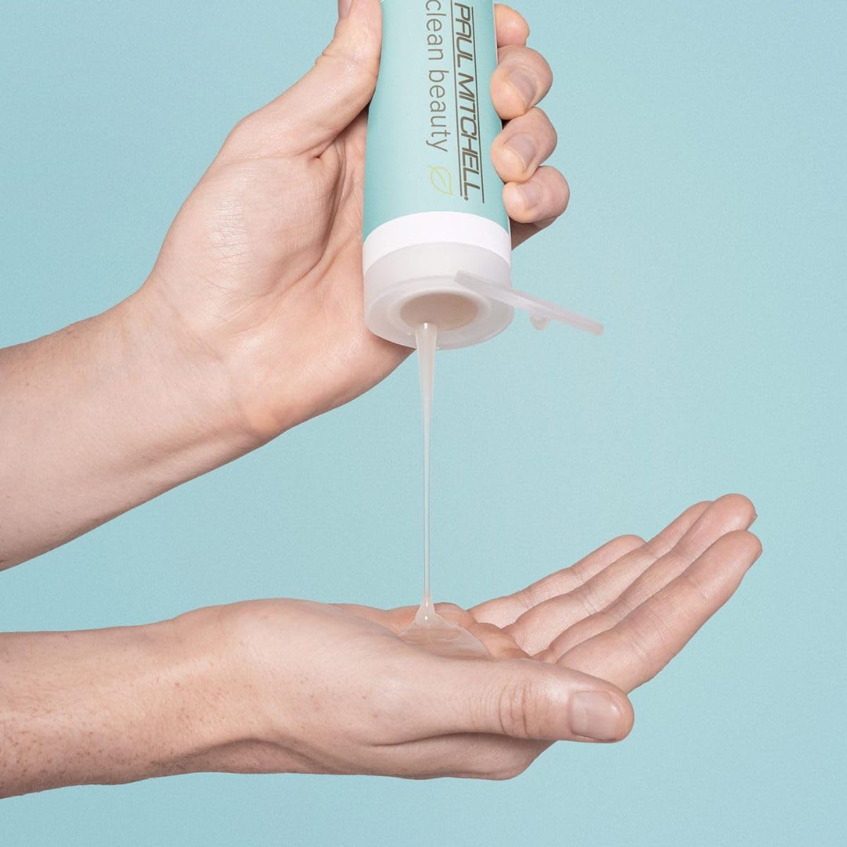 Paul Mitchell pump and bottle texture highlighting eco-friendly plastic and ease of use