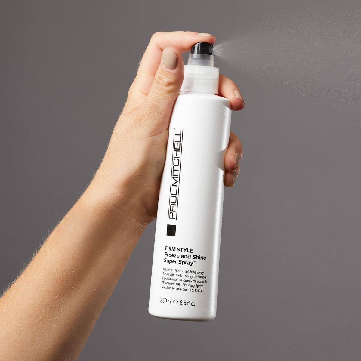 Paul Mitchell label and cap highlighting recyclable packaging and ingredient callouts