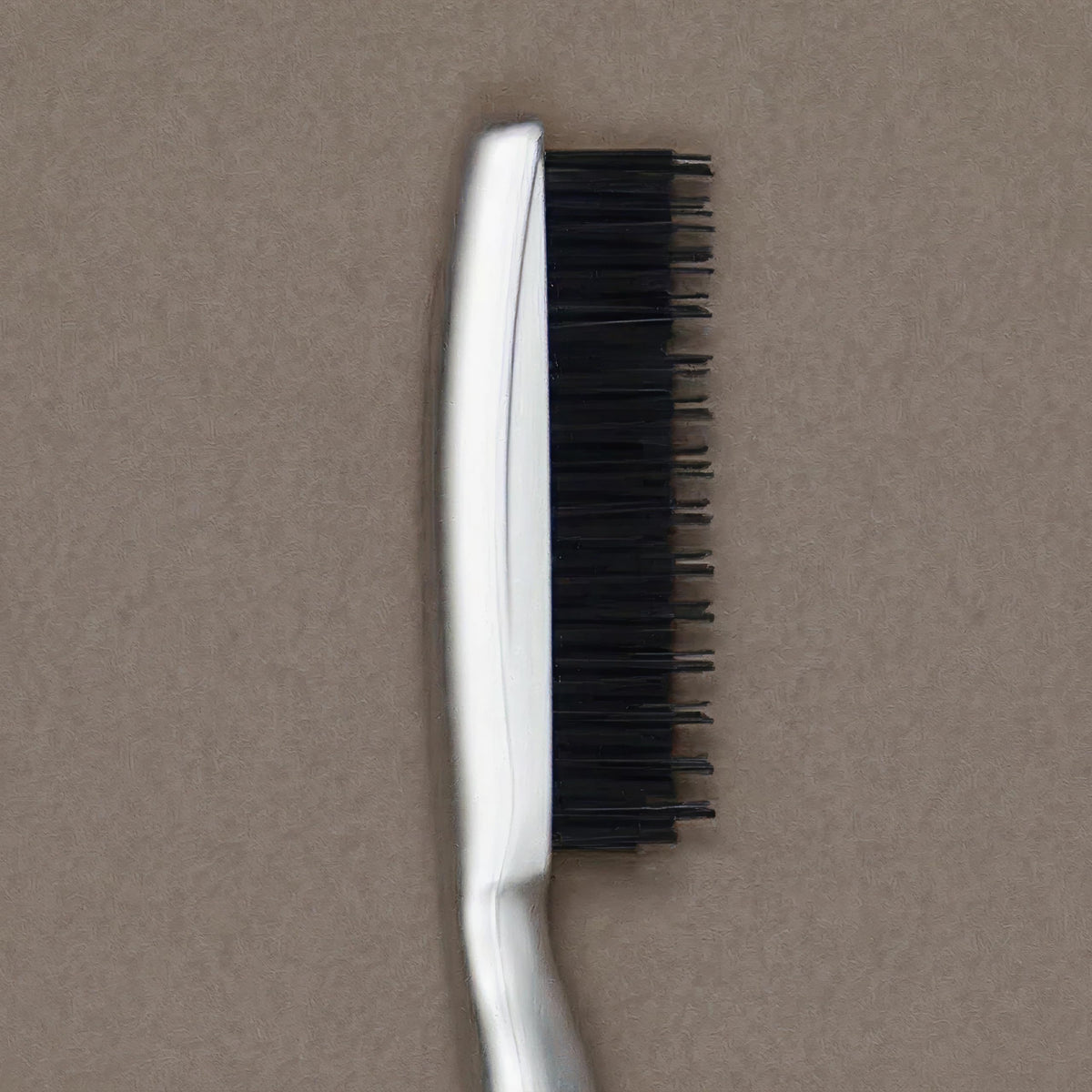 Paul Mitchell brush on a styling dresser next to clips showing ready-to-use convenience