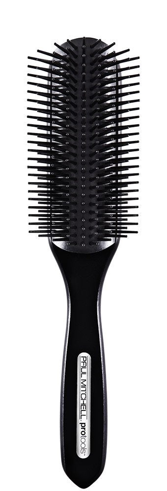 Paul Mitchell Pro Tools brush front view showing rounded head and handle for versatile styling