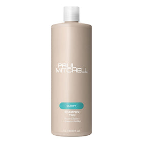Paul Mitchell bottle front view showing clear labeling and lemon scent benefit
