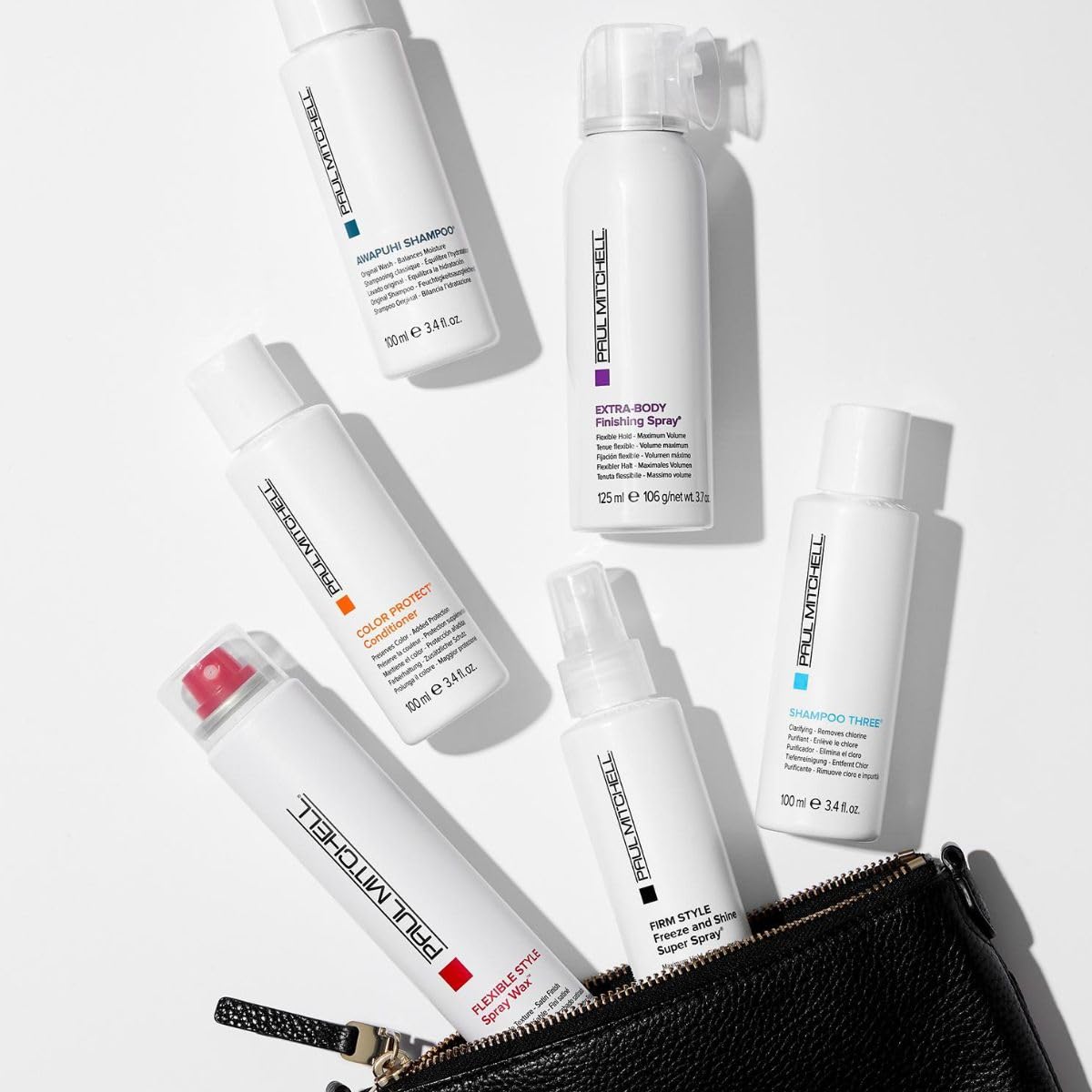 Paul Mitchell spray wax being applied into hair for volume and grip