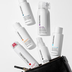 Paul Mitchell spray wax being applied into hair for volume and grip