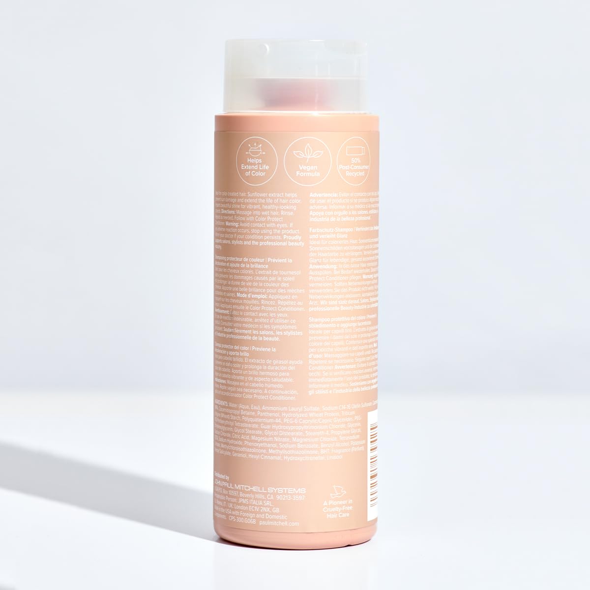 Paul Mitchell styled color-treated hair in lifestyle shot showing vibrant shine benefit