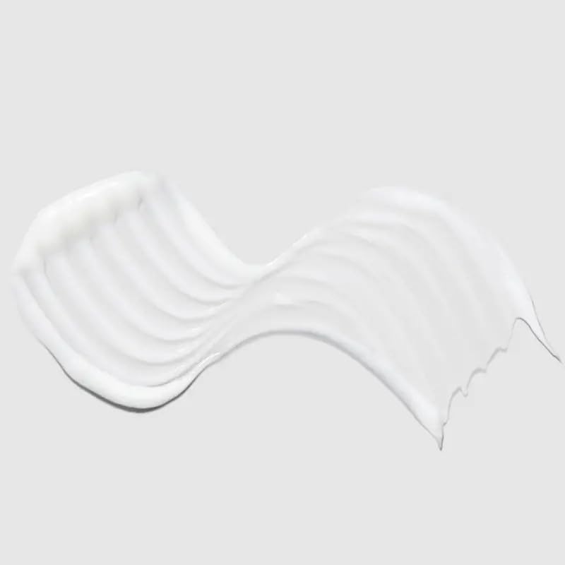 Paul Mitchell Super Strong Conditioner creamy texture close-up illustrating hydration and smoothness