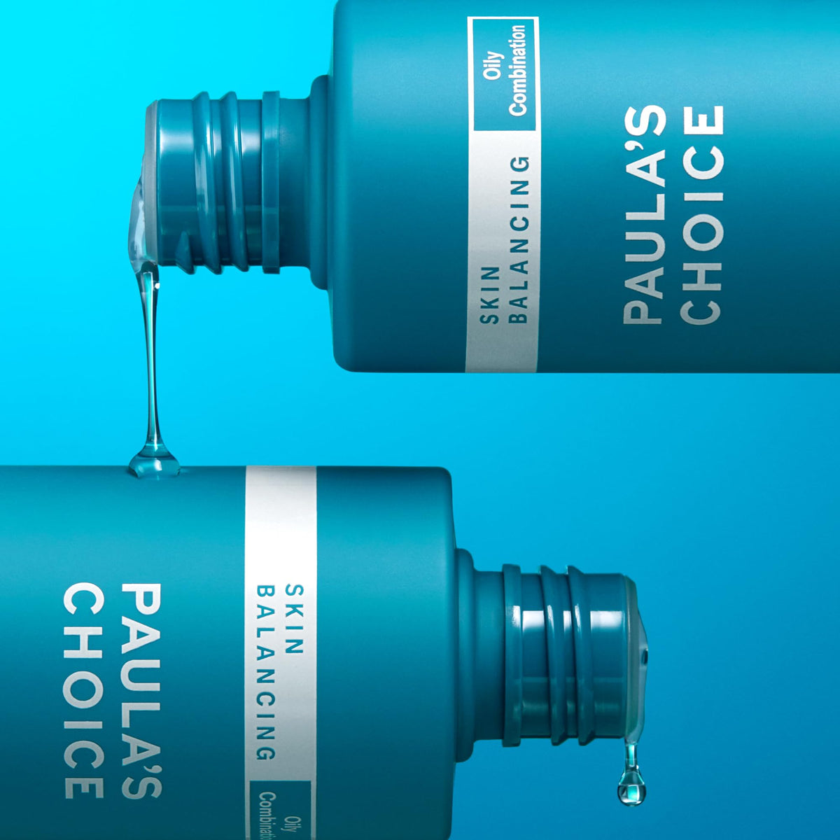 Paula's Choice 12 oz bottle beside ruler to show large size advantage