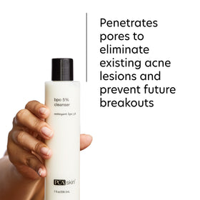 PCA SKIN bottle held in hand for size and scale reference