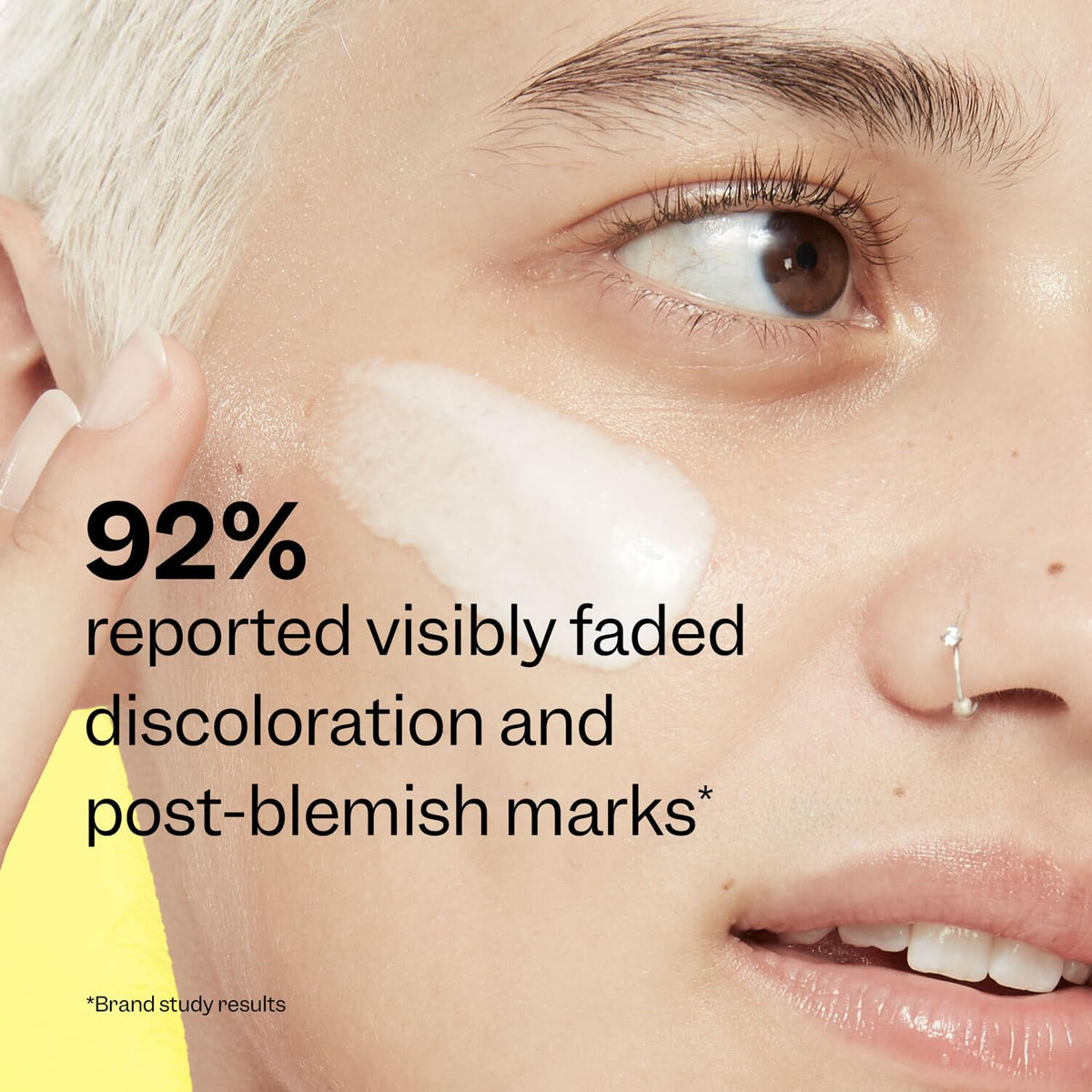 Peach Slices applying serum to face with fingertips, easy layering benefit