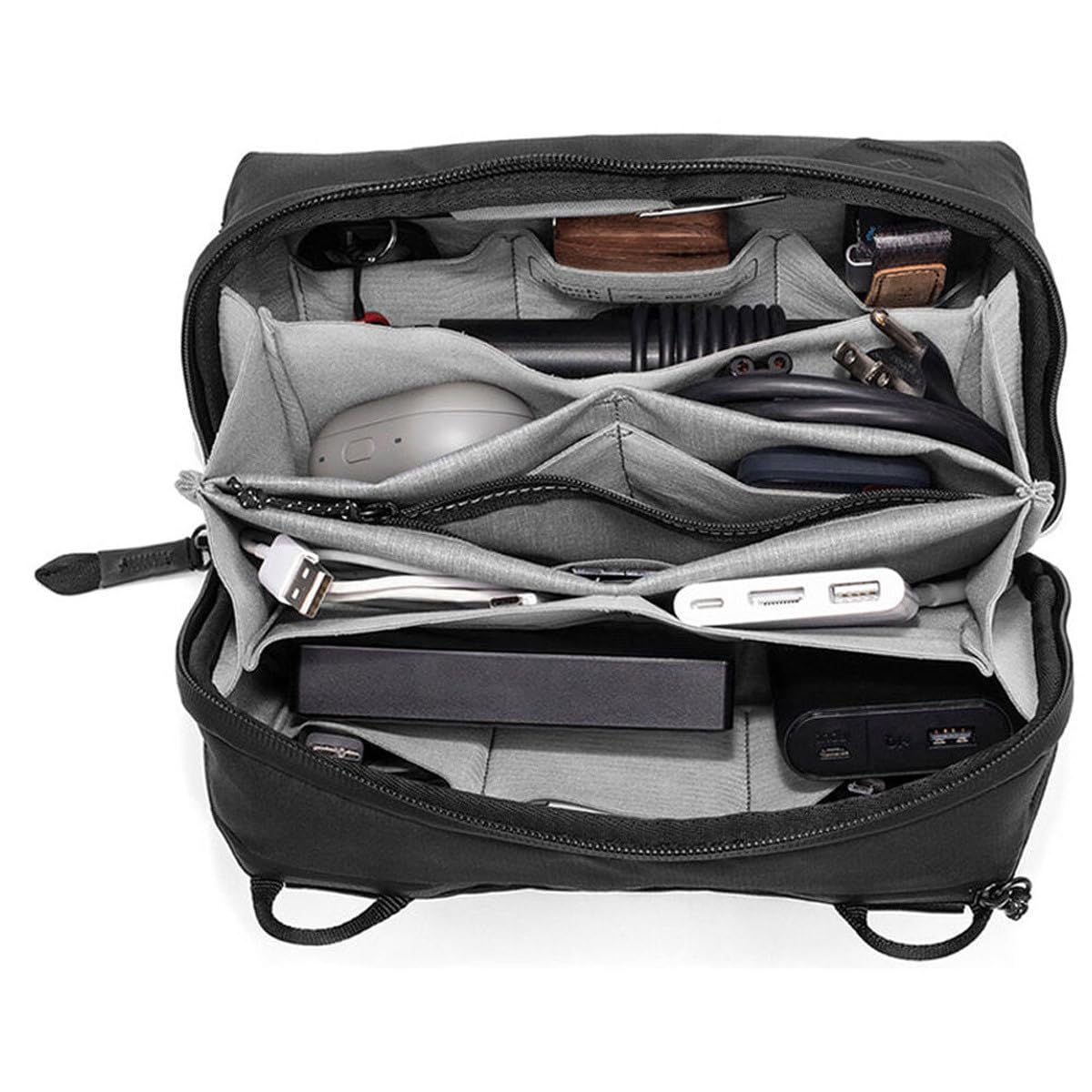 Peak Design external zip pocket with cable pass-through for charging on the move