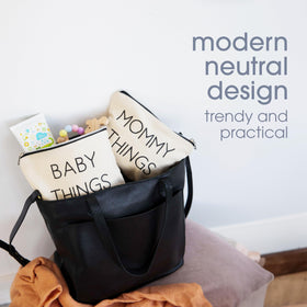 Pearhead baby pouch open with wipes and pacifier demonstrating organized baby essentials
