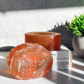 Pears bar in hand size scale showing convenient weight and everyday use