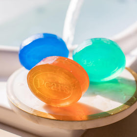 Pears soap bars on bathroom shelf in lifestyle scene emphasizing daily use