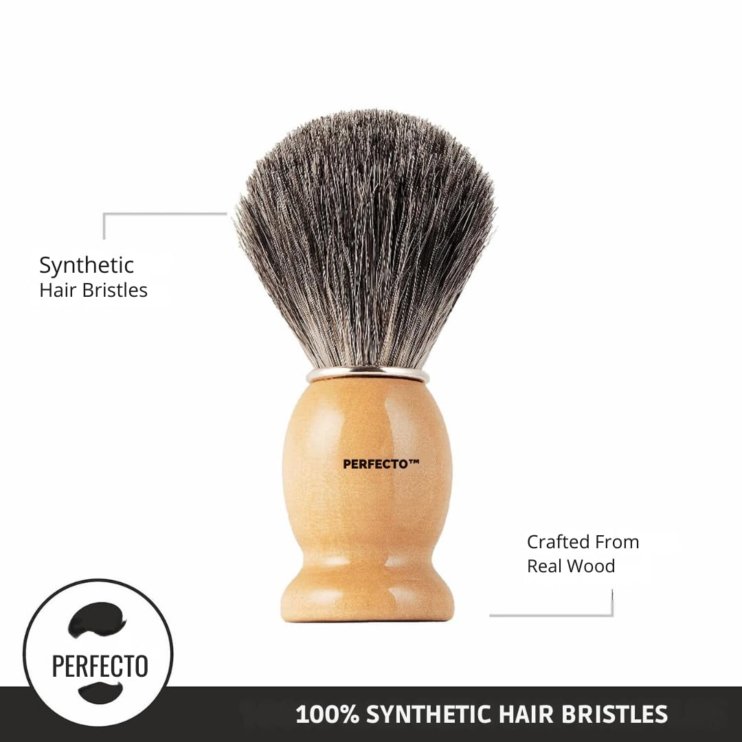 Perfecto brush next to coin for scale demonstrating compact travel size