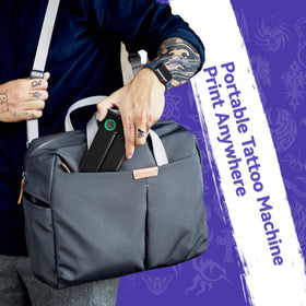 PeriPage P90 held in hand for scale, illustrating lightweight portability and convenience