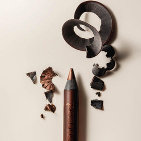 PERSONA sharpener beside travel pouch suggesting portability and convenient touch-ups benefit